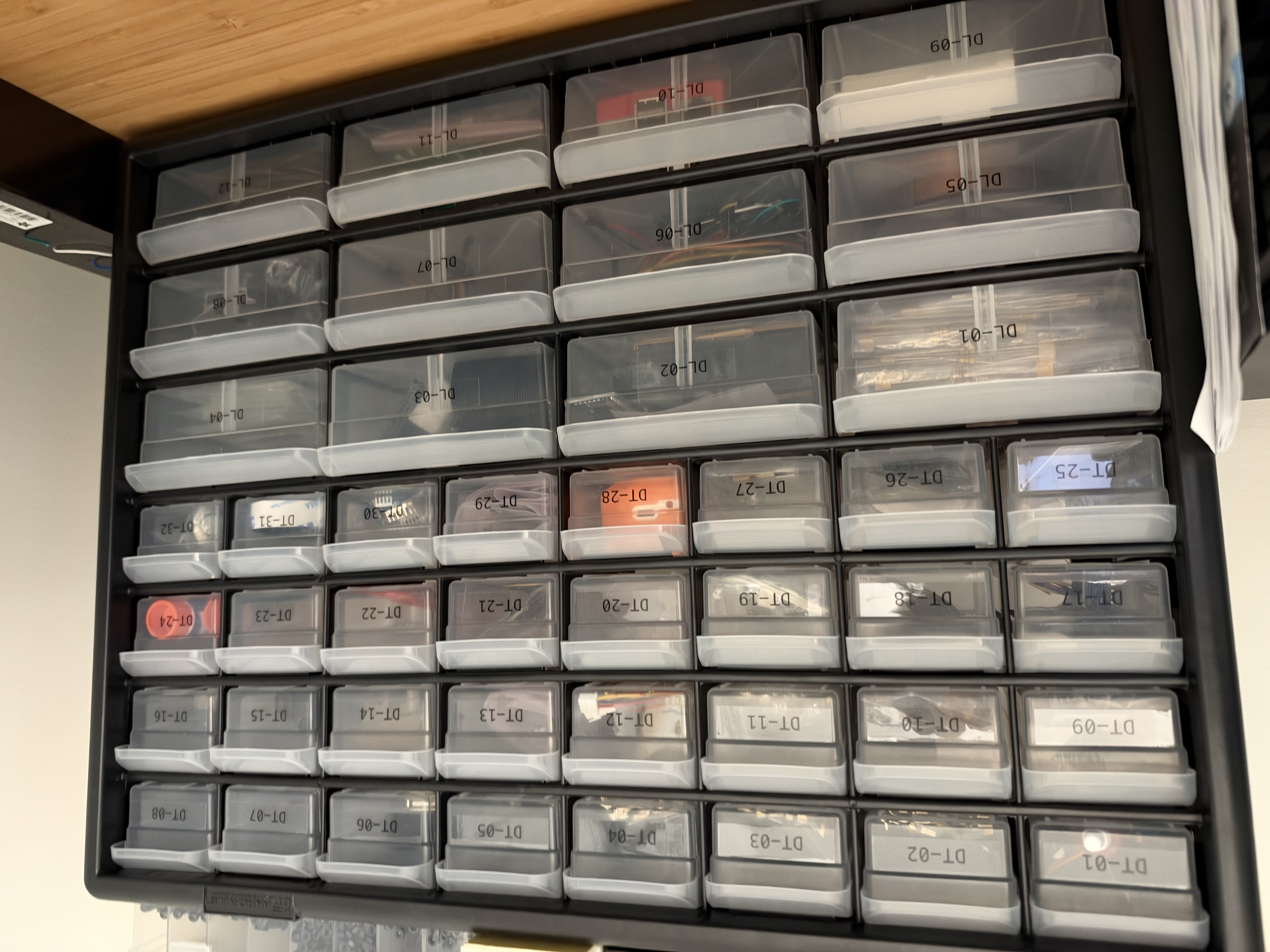 Desktop storage drawers labeled with DT and DL drawer numbers