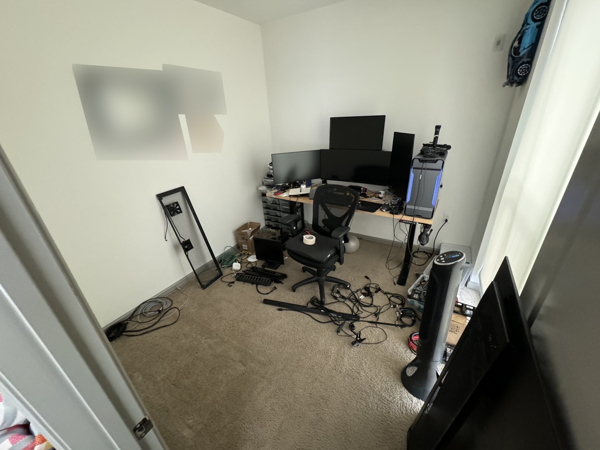 The desk and gear before everything found a home.